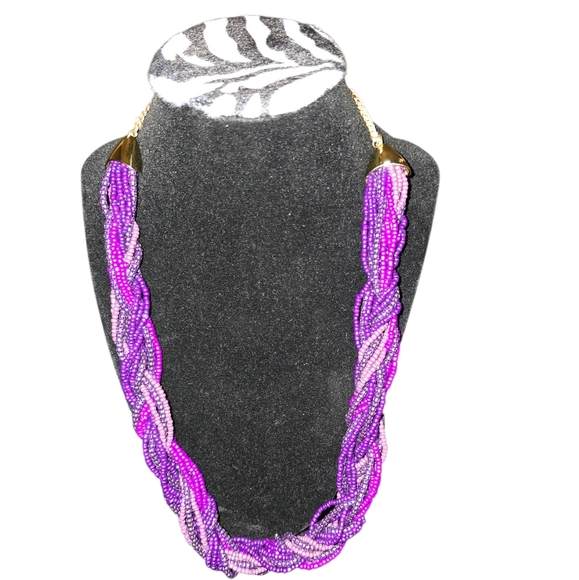 Jewelry - Purple multi stran beaded necklace.